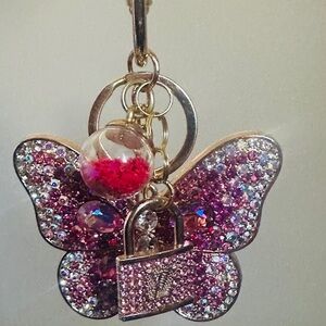 Louis Vuitton AUTHENTIC charm & Butterfly pink Bling bag/keychain. Original New